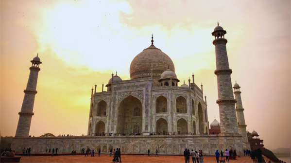 The Taj Mahal shimmering in white marble, a symbol of eternal love.