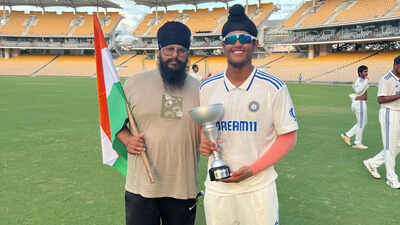Harvansh Singh poses with his supportive father