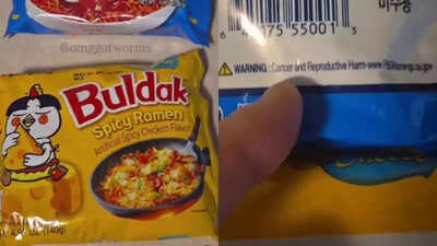 Close-up of instant ramen packaging with cancer warning label