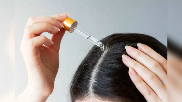 Using essential oils for hair growth.