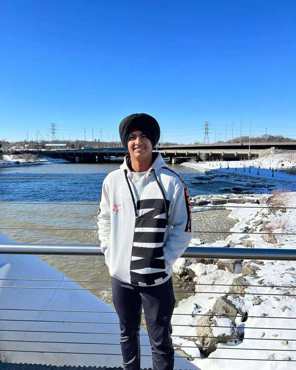 Harvansh with his family in Canada