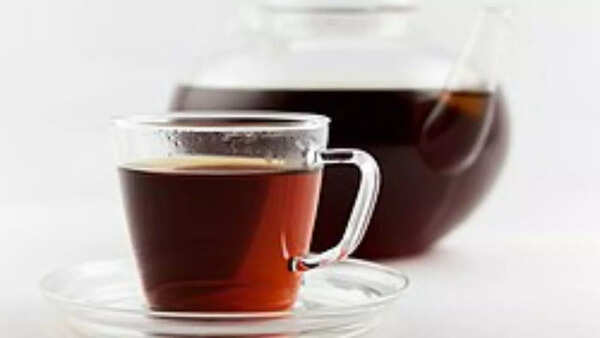Earthy red rooibos tea in a clear cup